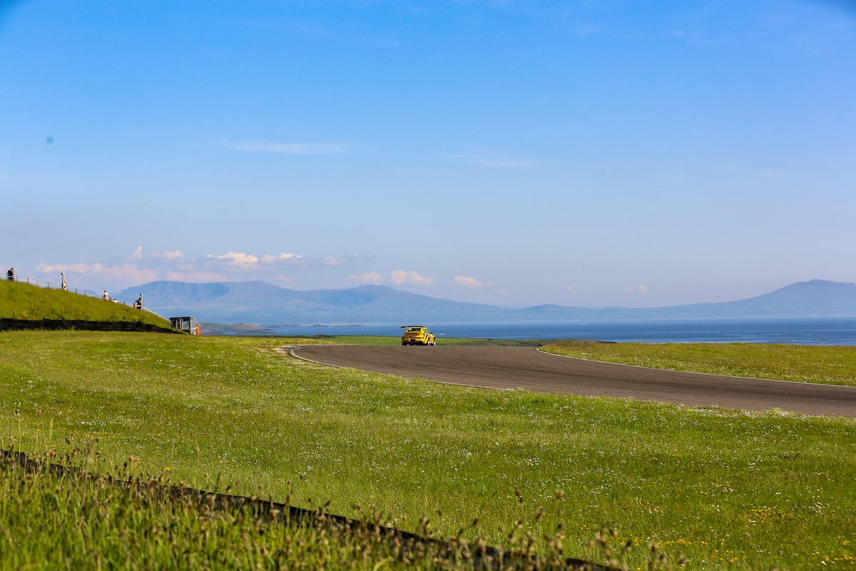 VANHAUEN RACING at Anglesey 2023 - The 903 against the Anglesey coastline, with the mountains beyond. © Jonathan Elsey Motorsport Photography 2023